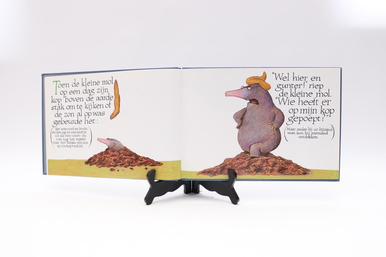 Over een kleine mol die wil weten wie er op zijn kop gepoept heeft