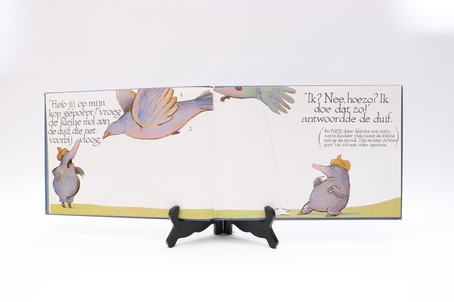 Over een kleine mol die wil weten wie er op zijn kop gepoept heeft